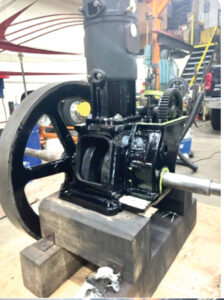 A gas engine in a workshop